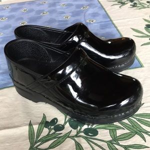 Dansko patent leather black clogs